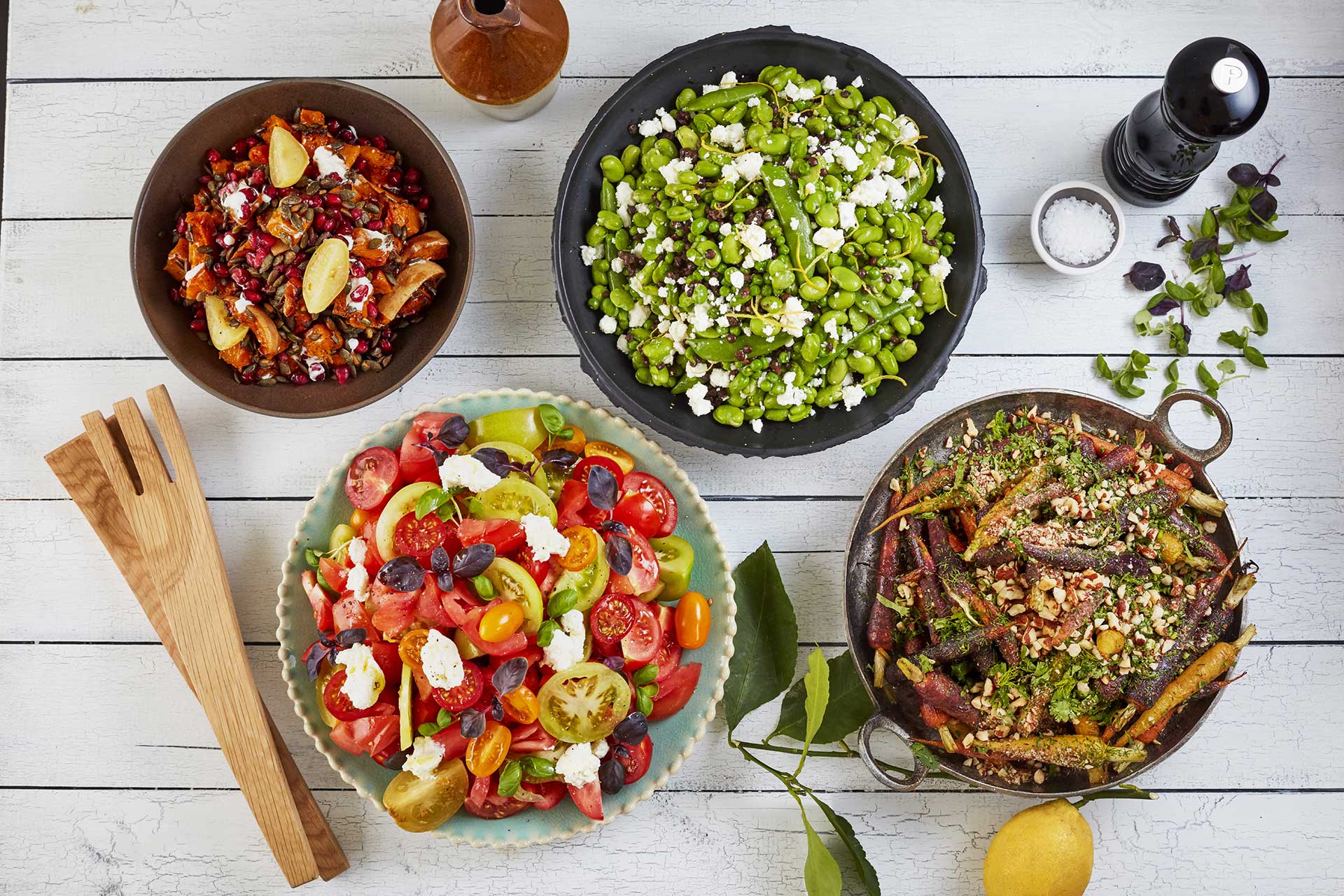 Overhead view of assorted salad dishes